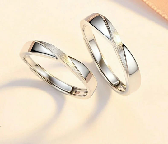 Adjustable Silver Couple Promise Twist Infinity Ring set featuring a contemporary design symbolizing eternal love, crafted from high-quality silver.