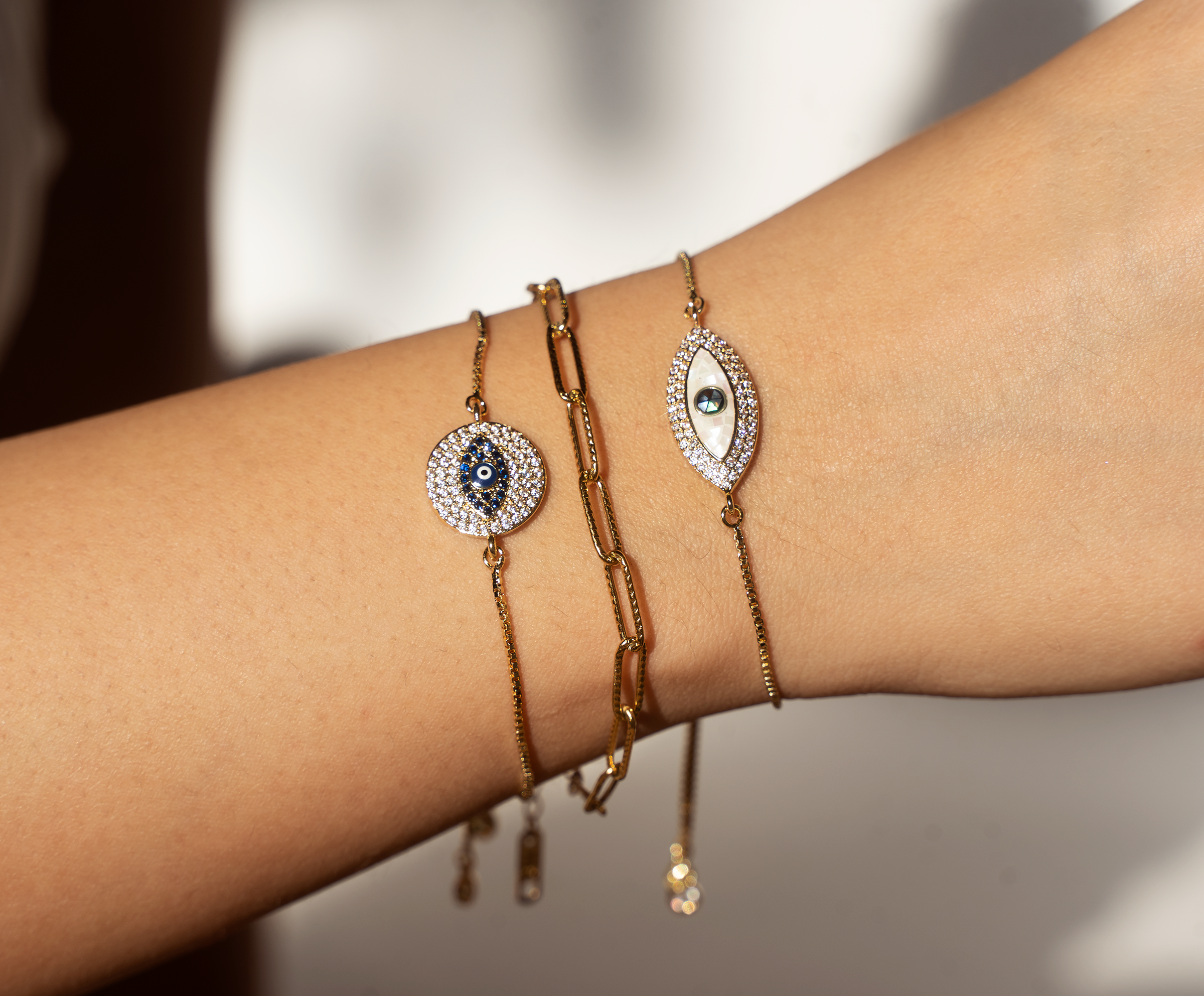 AMARA Bracelet featuring an adjustable bolo design with a colorful cubic zirconia evil eye charm, elegantly crafted in 18K gold plated brass.