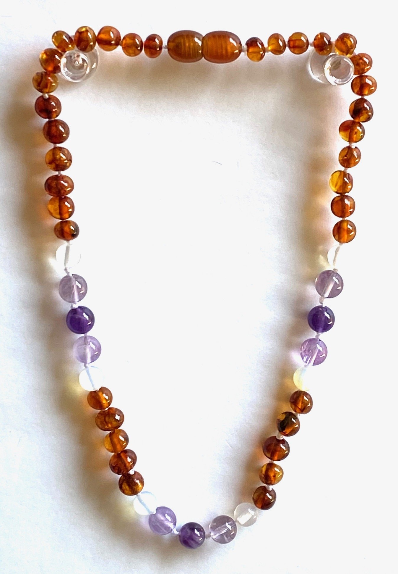 Amber + Opalite + Amethyst Baby necklace featuring colorful beads, secure clasp, and designed for teething relief.