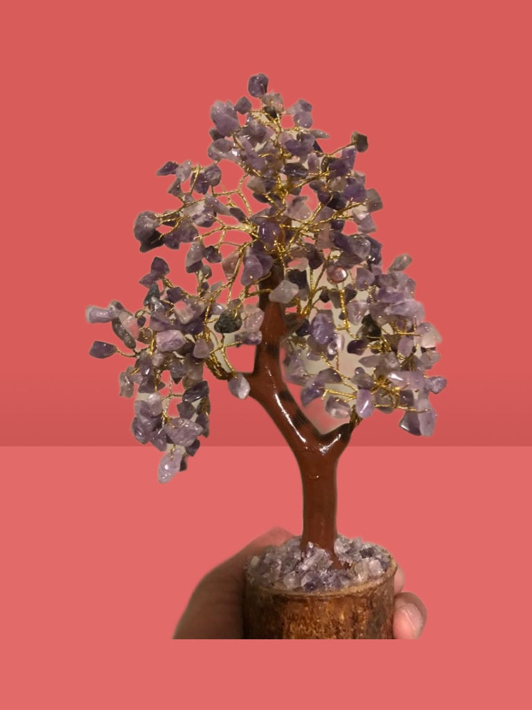 A beautiful Amethyst Crystal Tree made of 300 natural gemstone chips, standing 10 to 11 inches tall, showcasing vibrant purple hues.