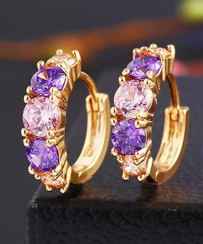 Elegant Amethyst Multistone Huggie Earrings featuring Austrian Crystals, crafted in 18K gold plating, showcasing a luxurious and stylish design.