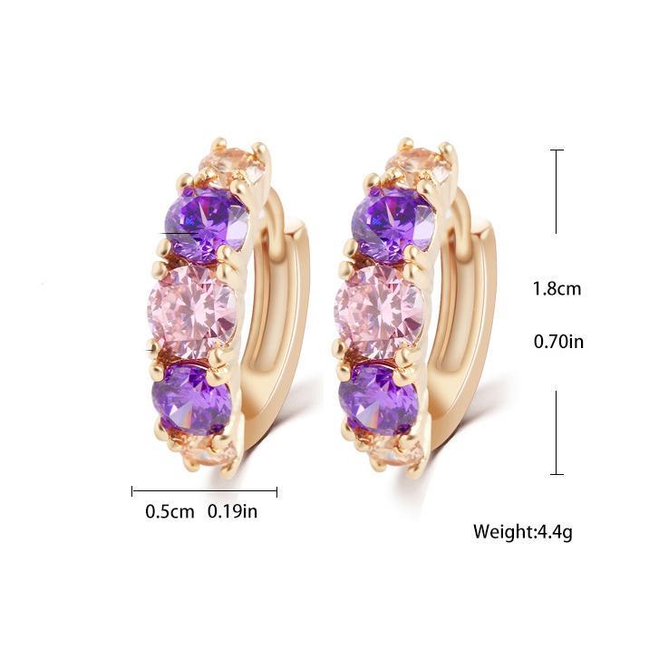 Elegant Amethyst Multistone Huggie Earrings featuring Austrian Crystals, crafted in 18K gold plating, showcasing a luxurious and stylish design.