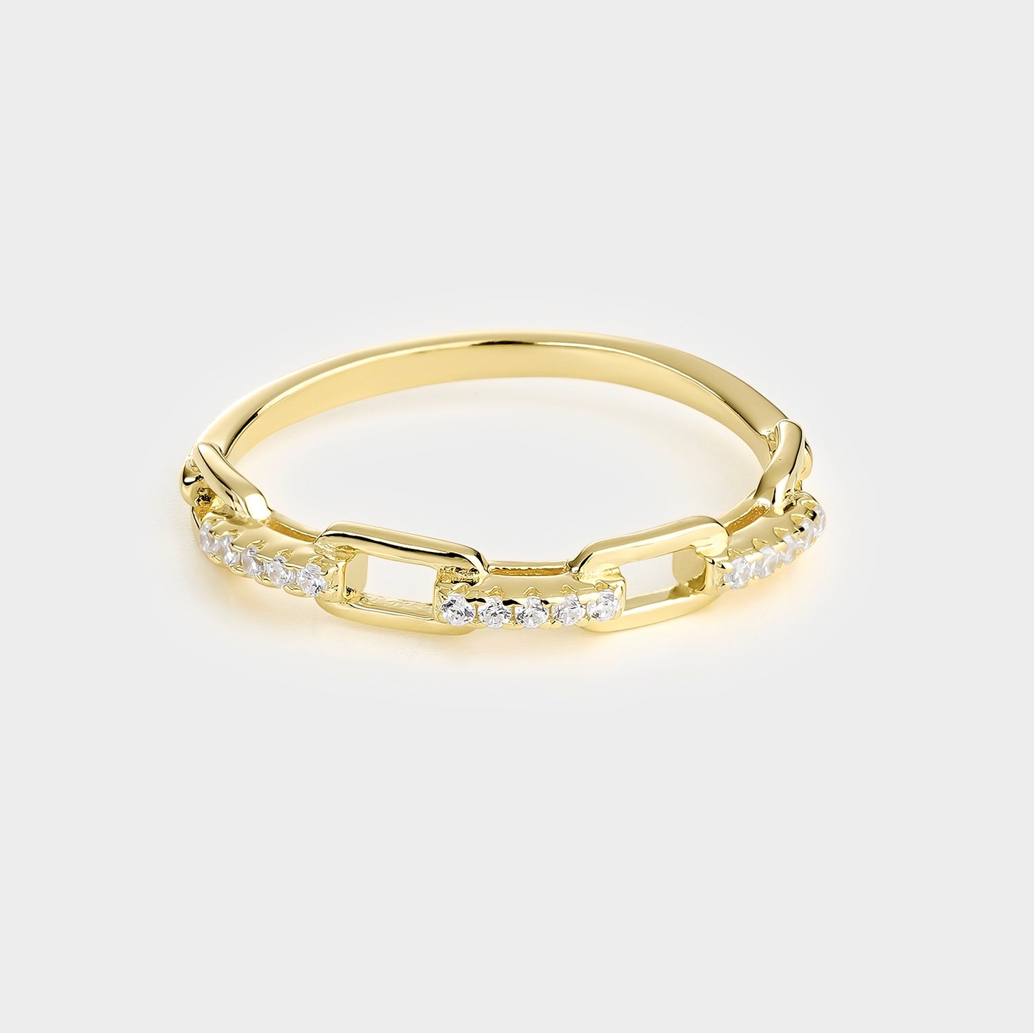Anillo de plata y oro 18K con circonitas blancas, elegante diseño moderno con brillo excepcional.