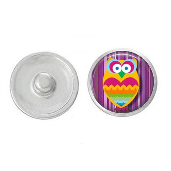 Colorful hand-pressed owl snap designed for jewelry customization, featuring vibrant colors and intricate details.