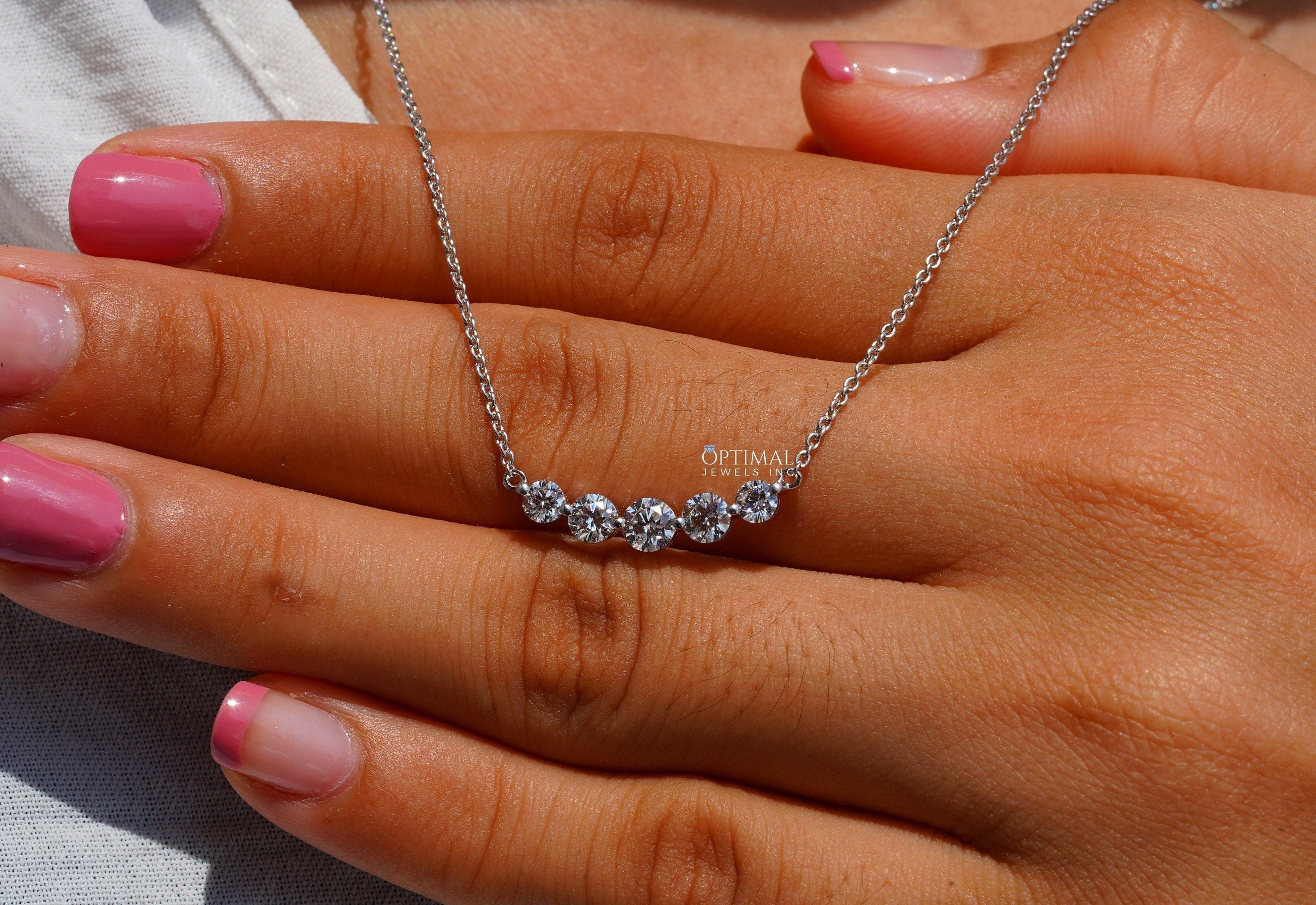 Antique Five Stone Lab Grown Diamond Necklace featuring 0.98 CTW round cut diamonds on an 18-inch white gold chain.