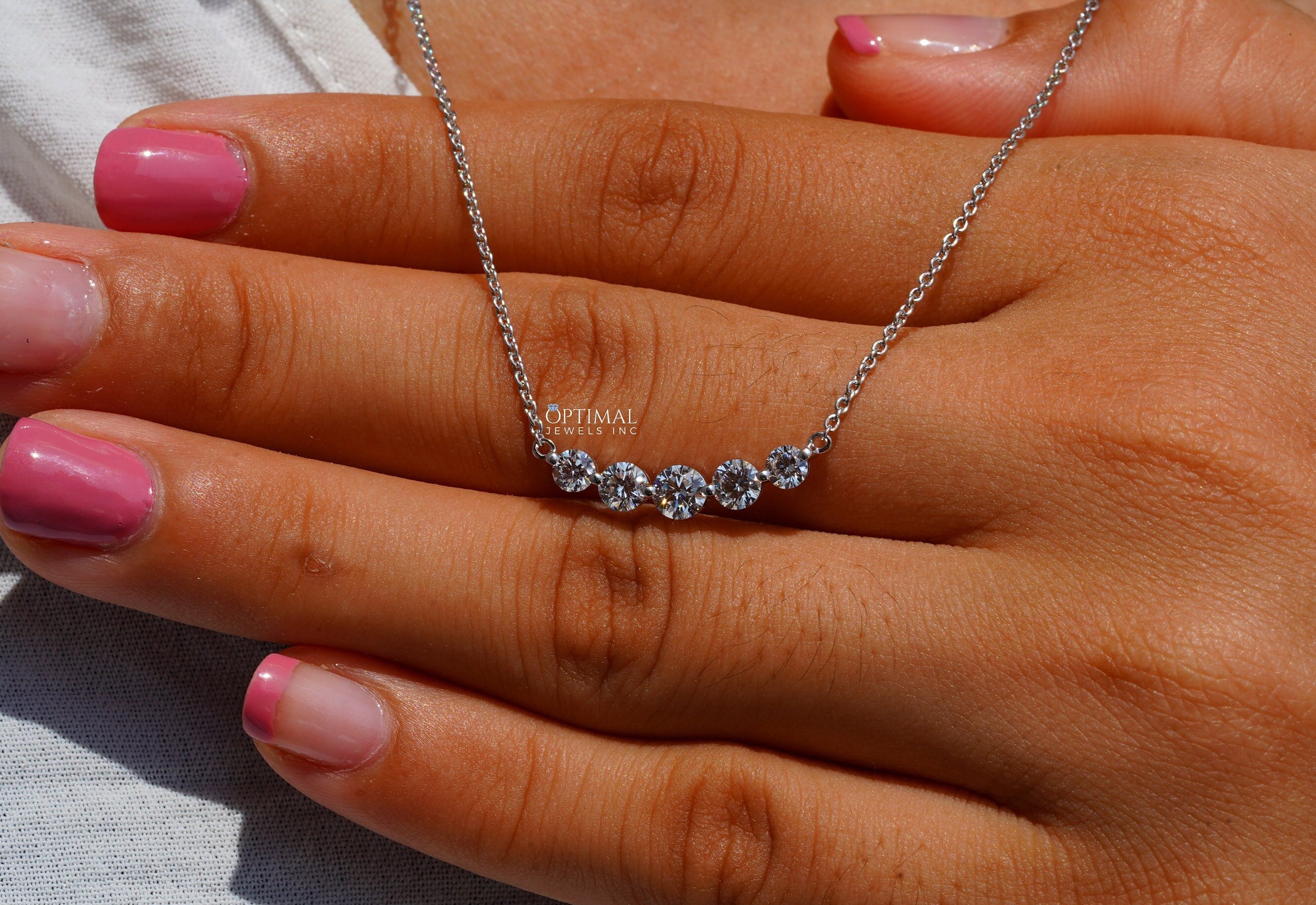 Antique Five Stone Lab Grown Diamond Necklace featuring 0.98 CTW round cut diamonds on an 18-inch white gold chain.