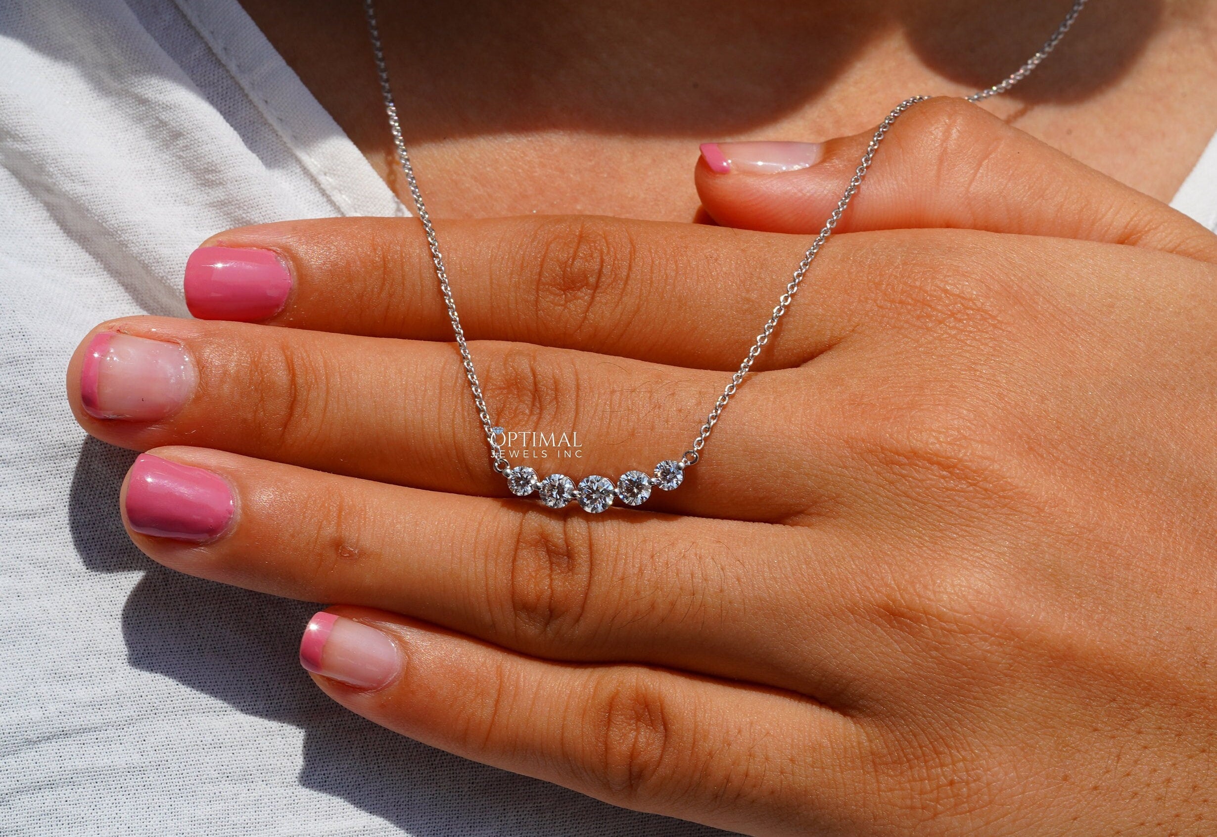 Antique Five Stone Lab Grown Diamond Necklace featuring 0.98 CTW round cut diamonds on an 18-inch white gold chain.