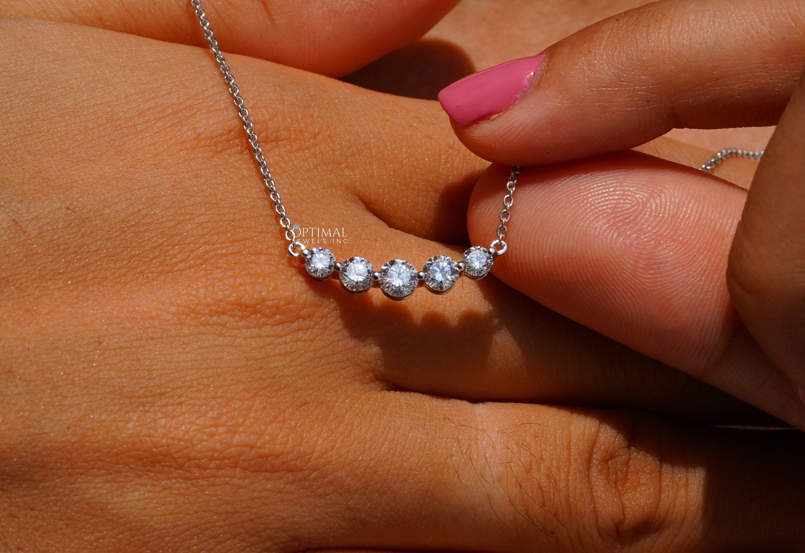 Antique Five Stone Lab Grown Diamond Necklace featuring 0.98 CTW round cut diamonds on an 18-inch white gold chain.