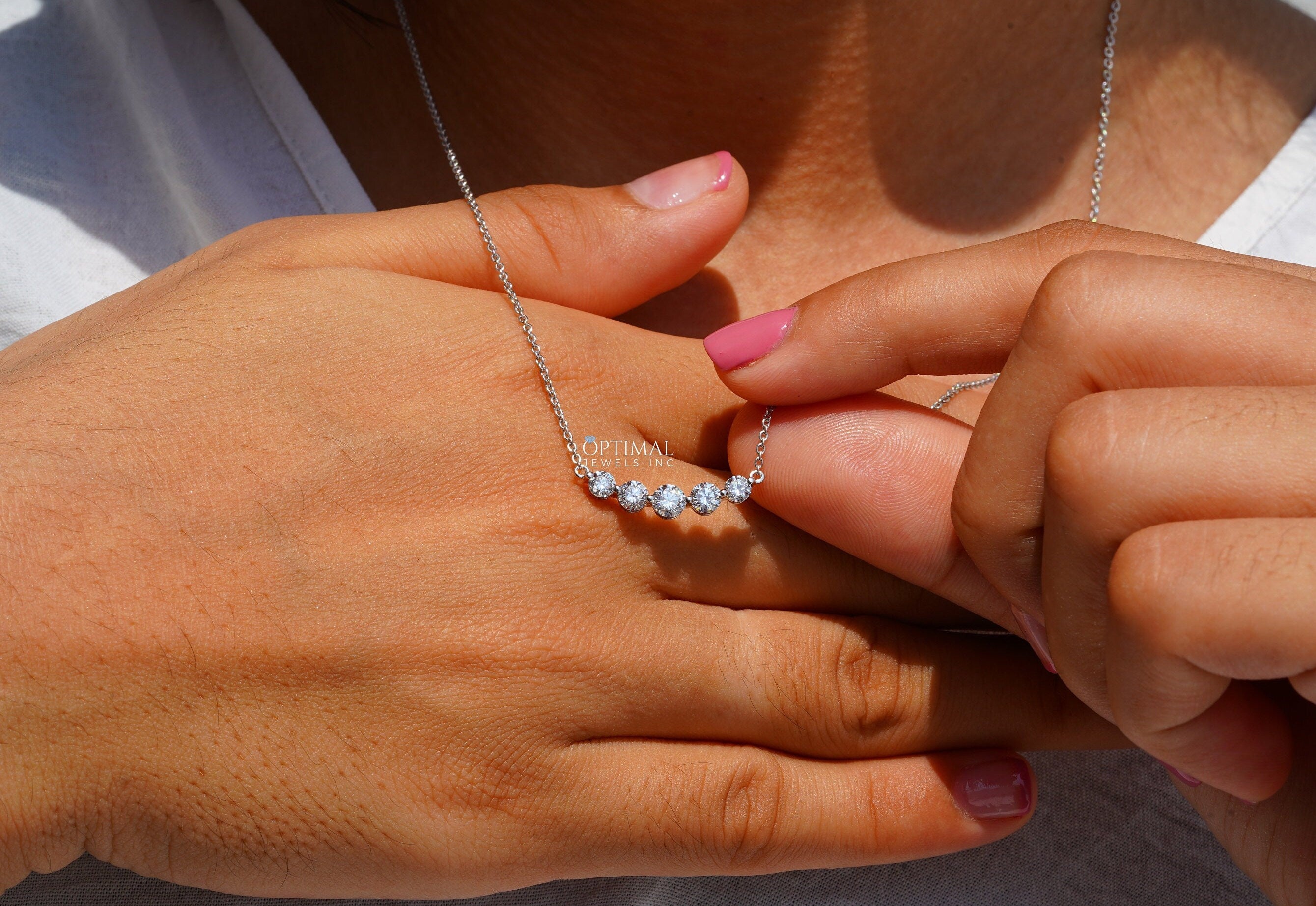 Antique Five Stone Lab Grown Diamond Necklace featuring 0.98 CTW round cut diamonds on an 18-inch white gold chain.