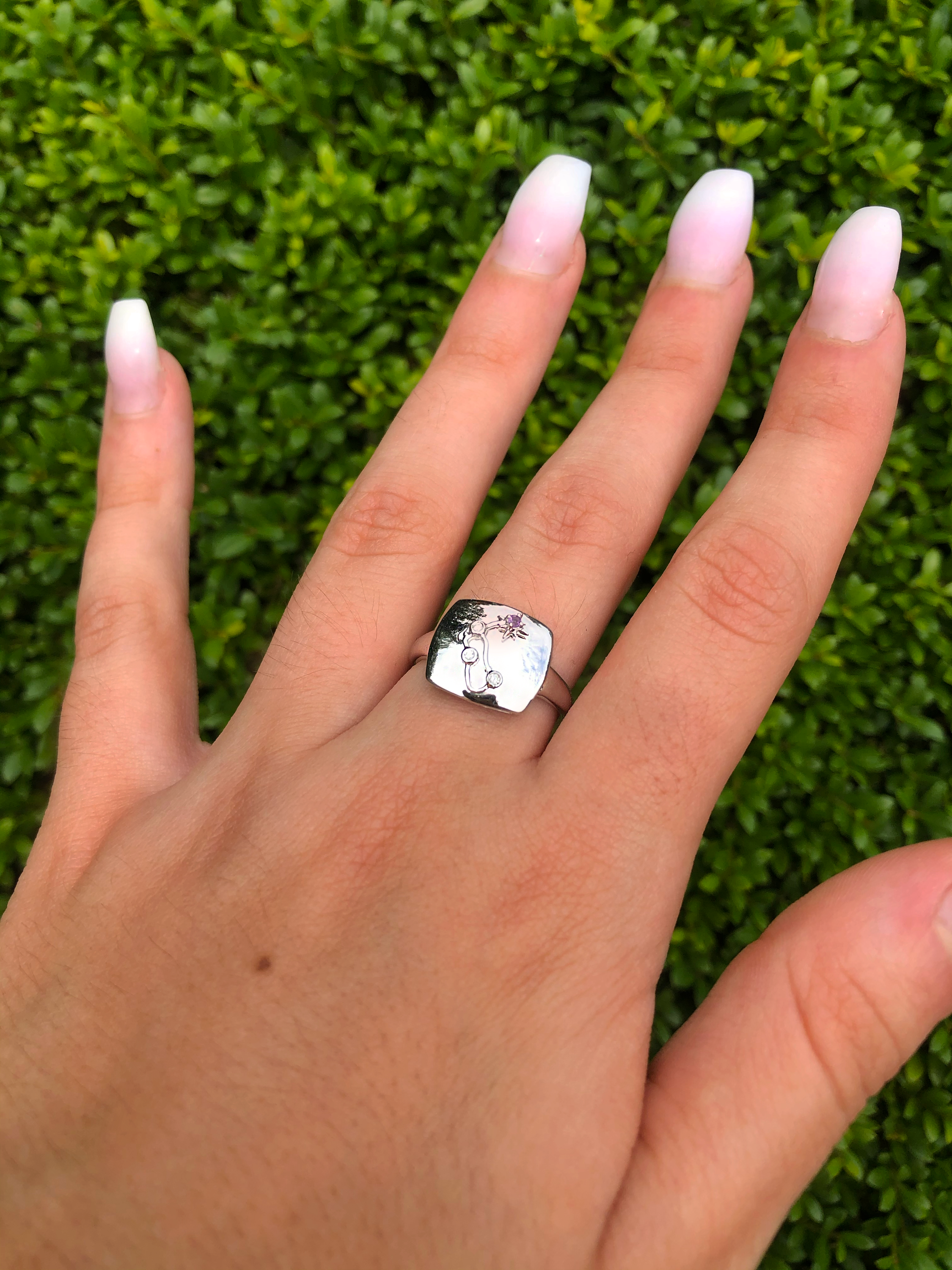 Aquarius Water-Bearer Amethyst & Diamond Constellation Signet Ring in 14K White Gold, featuring an amethyst gemstone and diamond accents.