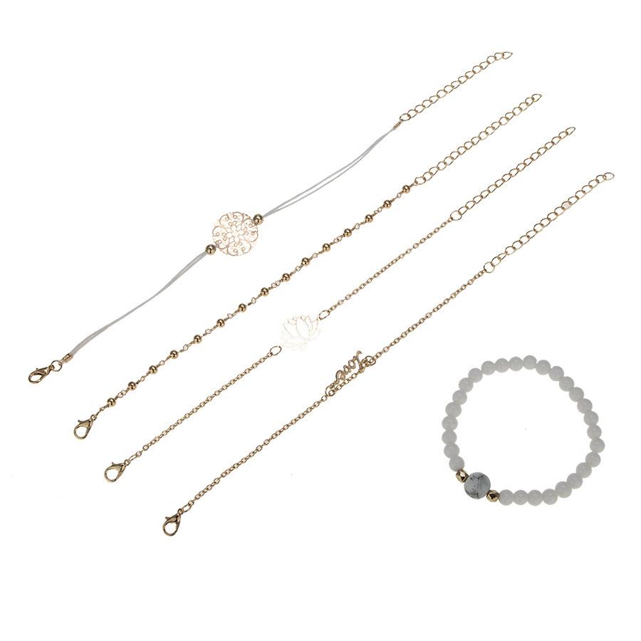 Arcoris White Marble Filigree Pendant and Love Bracelet Set featuring 14K gold plating and celestial design.