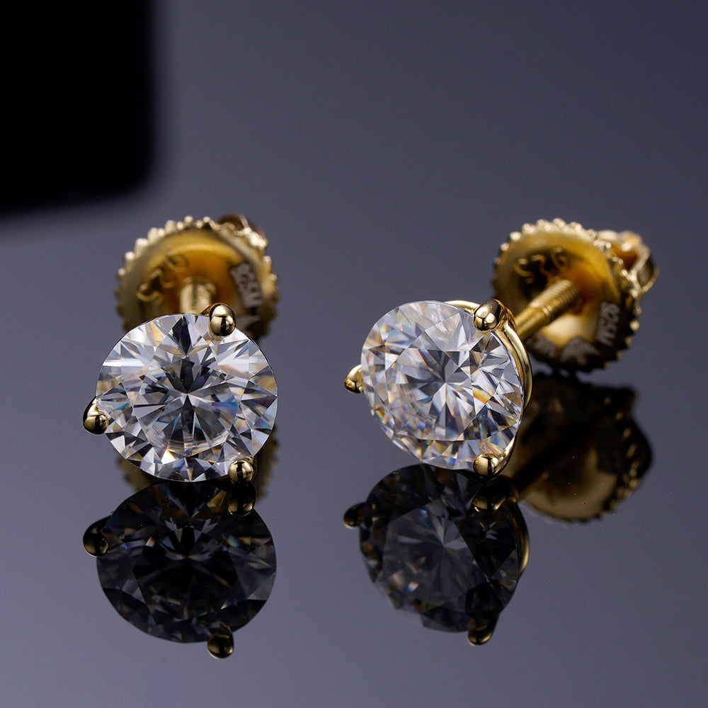 A pair of elegant ARGENTUM 925 Moissanite Earrings in a gold color setting, showcasing their brilliant sparkle and minimalistic design.