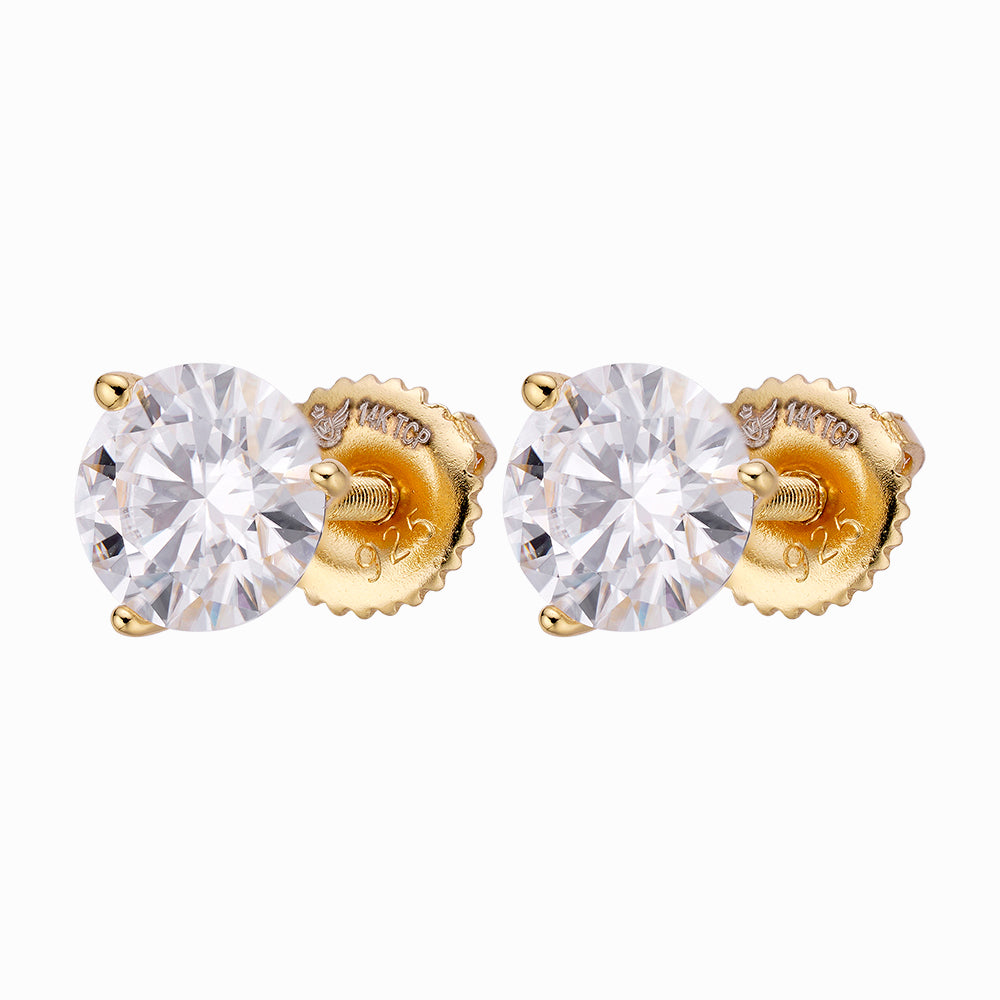 A pair of elegant ARGENTUM 925 Moissanite Earrings in a gold color setting, showcasing their brilliant sparkle and minimalistic design.
