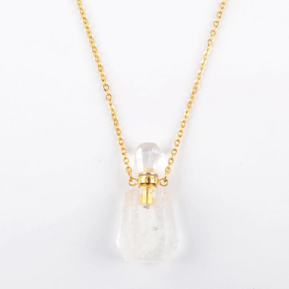 Aroma Gem Necklace featuring a gold plated chain and a crystal pendant designed for essential oil infusion.
