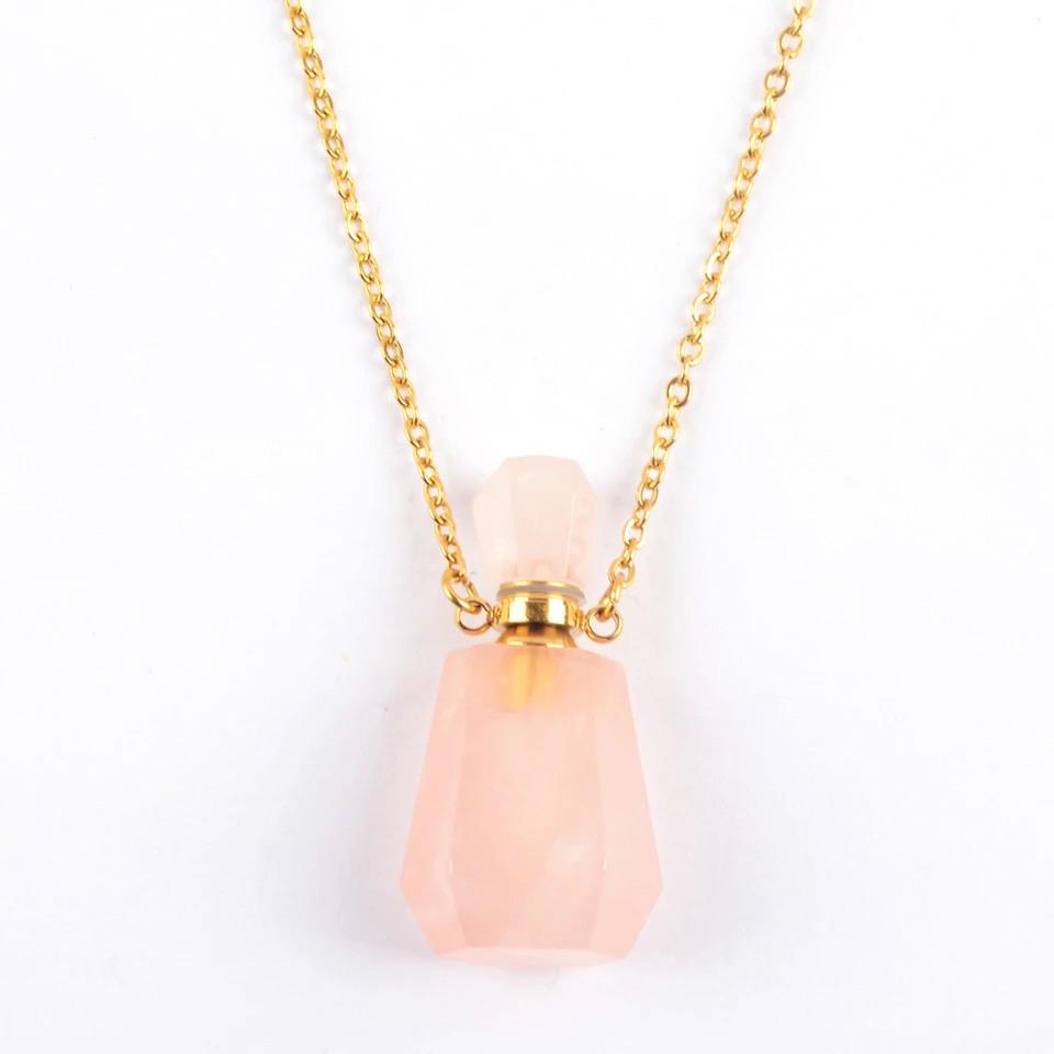 Aroma Gem Necklace featuring a gold plated chain and a crystal pendant designed for essential oil infusion.