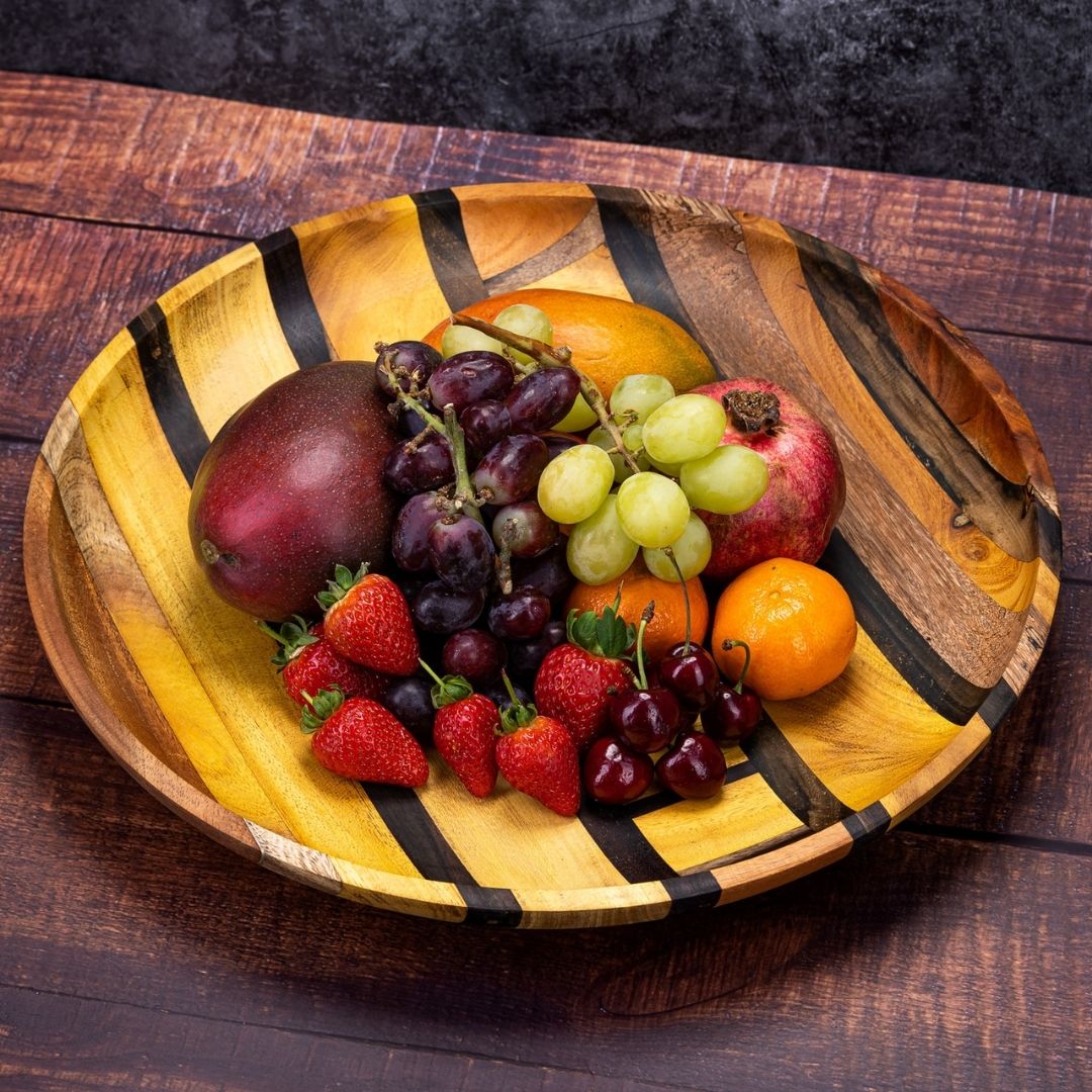 Artisan Upcycled End Grain Fruit Bowls in two sizes and patterns, showcasing rich wood grains and unique shapes, perfect for serving or decoration.