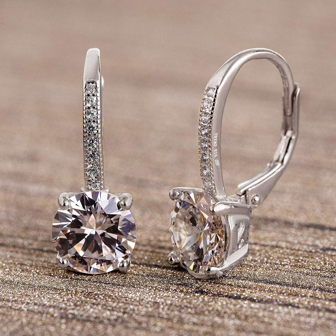Elegant Asscher Cut Elements Pavé Leverback Earrings in 14K White Gold, showcasing their unique design and sparkling stones.