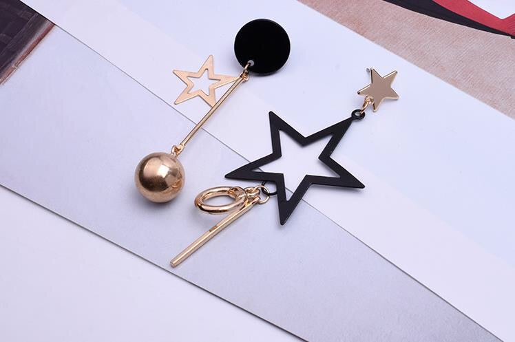 Asymmetric Black Gold Star Slinky Earrings showcasing a unique design with elegant black and gold colors, perfect for any occasion.