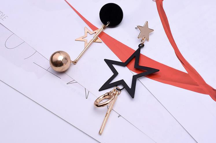 Asymmetric Black Gold Star Slinky Earrings showcasing a unique design with elegant black and gold colors, perfect for any occasion.