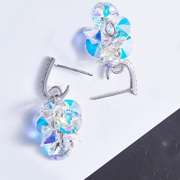 Elegant Aurora Borealis dangling cluster grapevine earrings in 14K white gold, featuring circular stones that shimmer with vibrant colors.