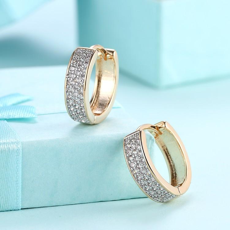 Austrian Crystal Micro Pav'e Classic Huggies Set in 18K Gold, featuring sparkling crystals and a butterfly backing.