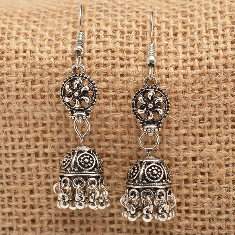 Baroque engraved bell earrings with tassel detail, showcasing intricate design and lightweight alloy material.