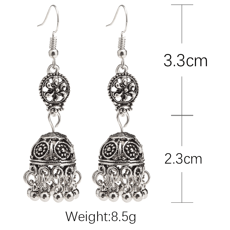 Baroque engraved bell earrings with tassel detail, showcasing intricate design and lightweight alloy material.