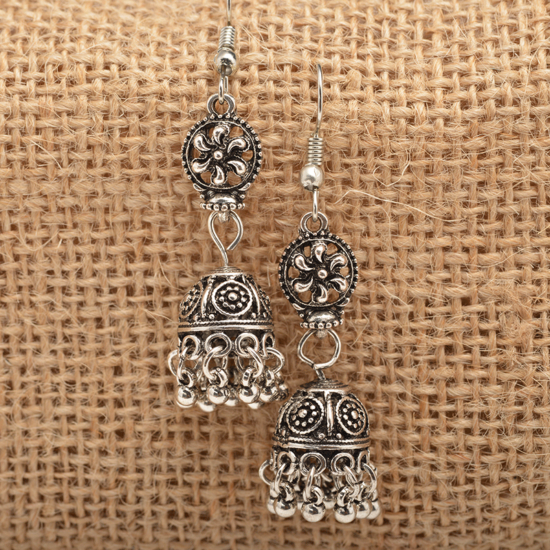 Baroque engraved bell earrings with tassel detail, showcasing intricate design and lightweight alloy material.
