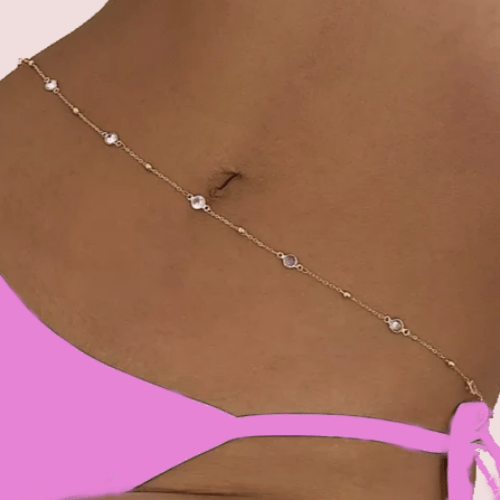 A beautiful Beachy Belly Waist Chain featuring sparkling rhinestones and golden balls, perfect for beach or casual wear.