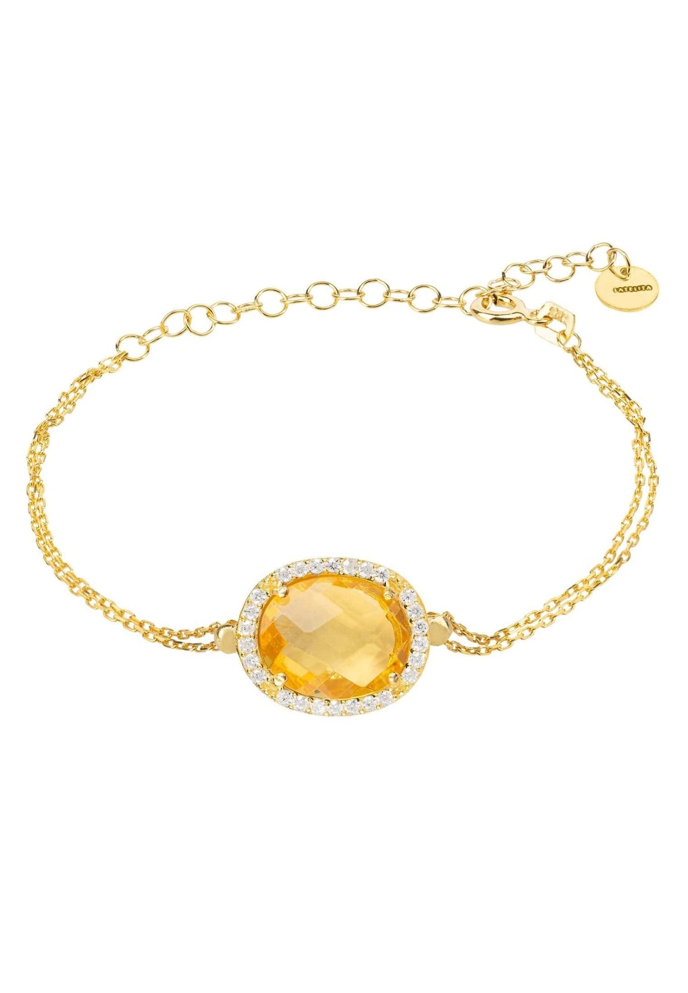 Beatrice Oval Gemstone Bracelet featuring a vibrant citrine surrounded by cubic zirconia on a gold plated double chain.