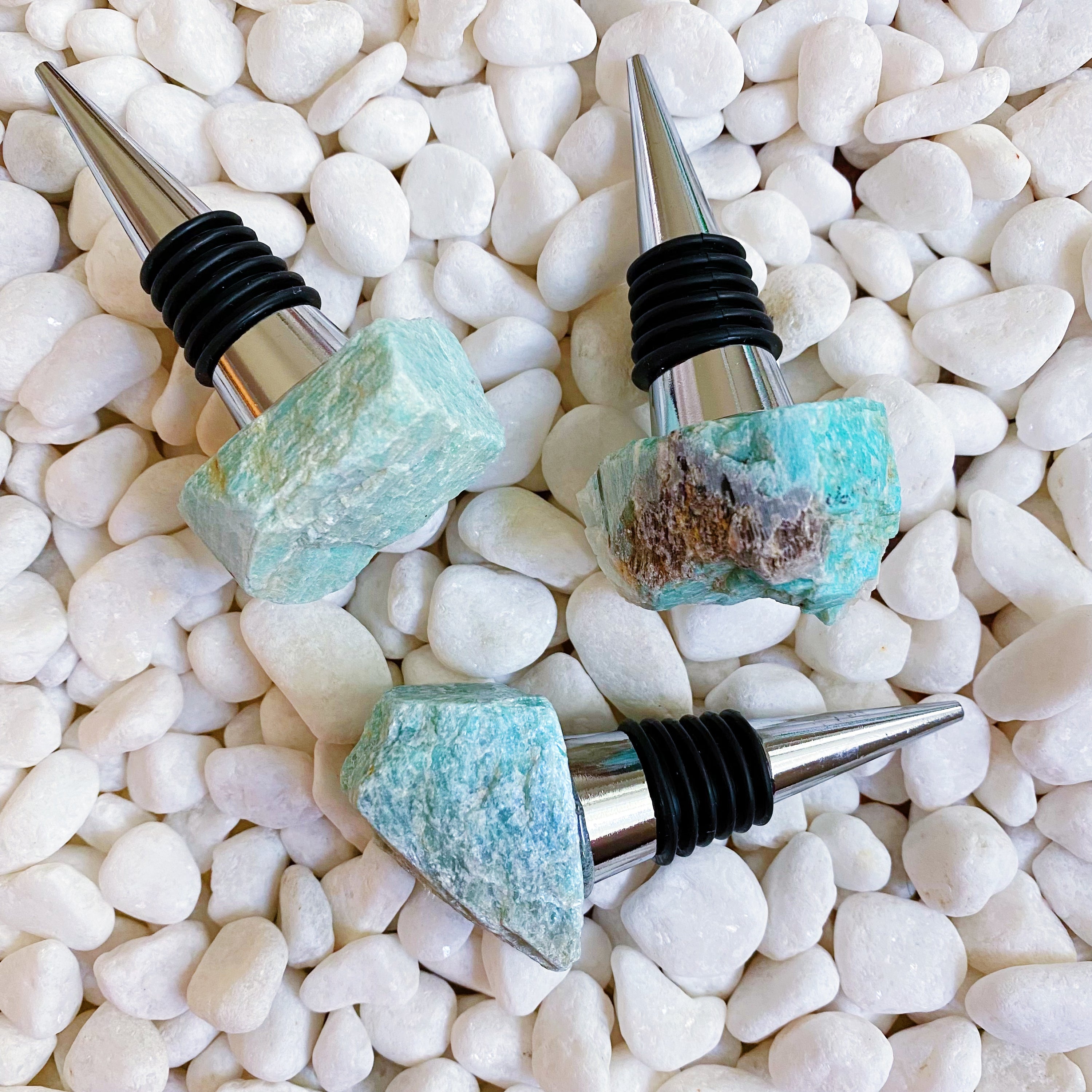 A luxurious wine stopper made from natural stone, showcasing unique patterns and colors, perfect for preserving wine.