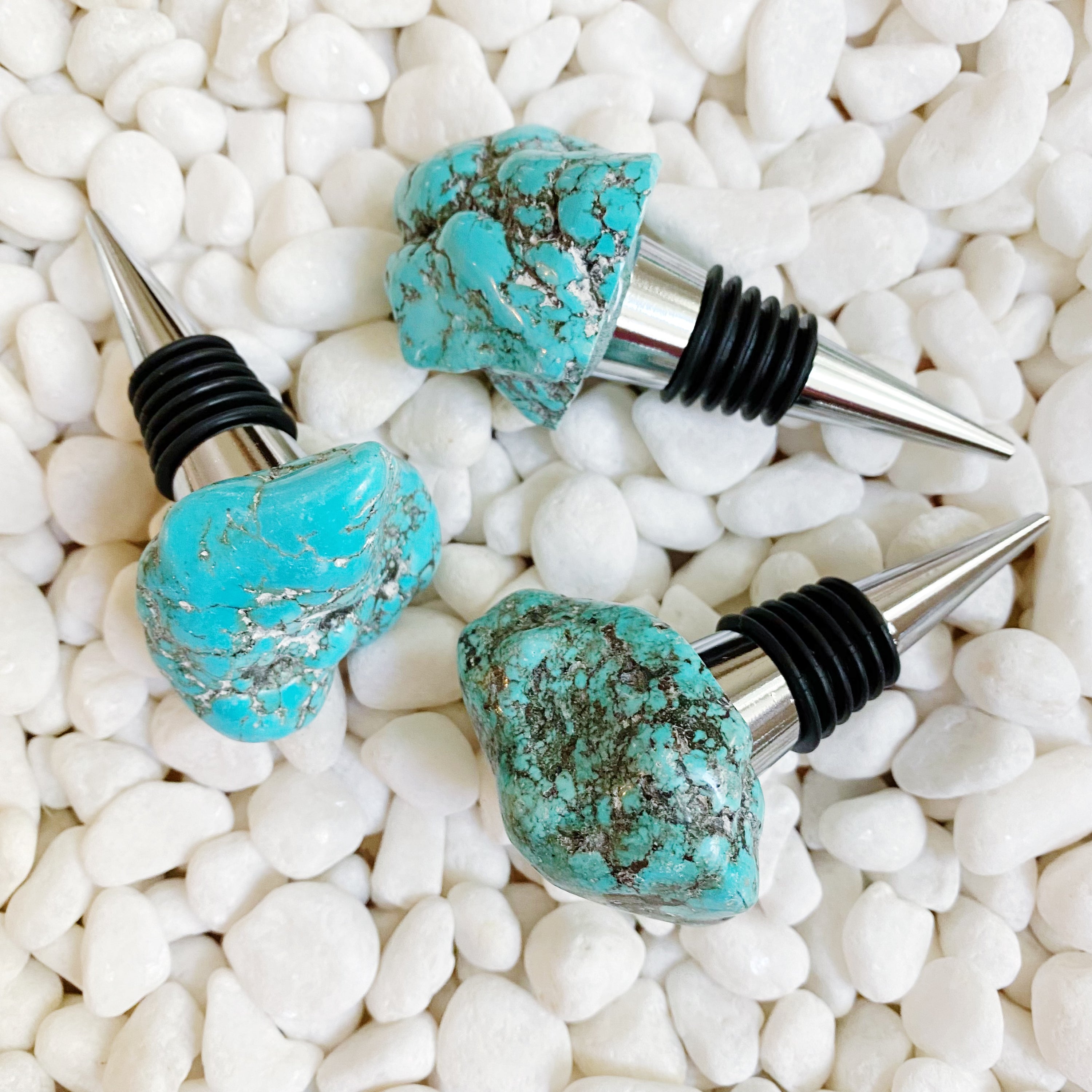 A luxurious wine stopper made from natural stone, showcasing unique patterns and colors, perfect for preserving wine.