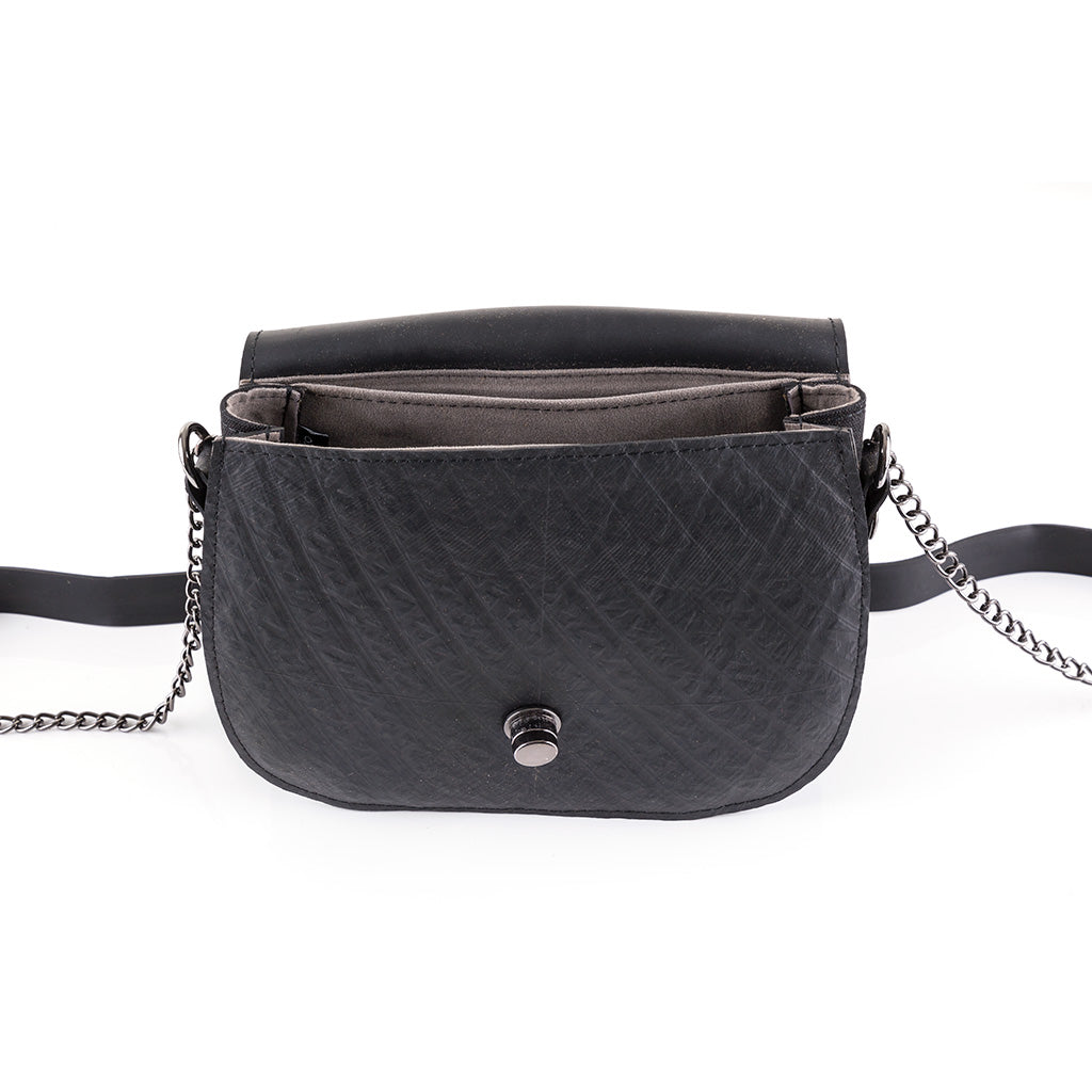 Becca Classic Black Vegan Saddle Bag made from recycled inner tubes, featuring unique patterns and grey velvet lining.