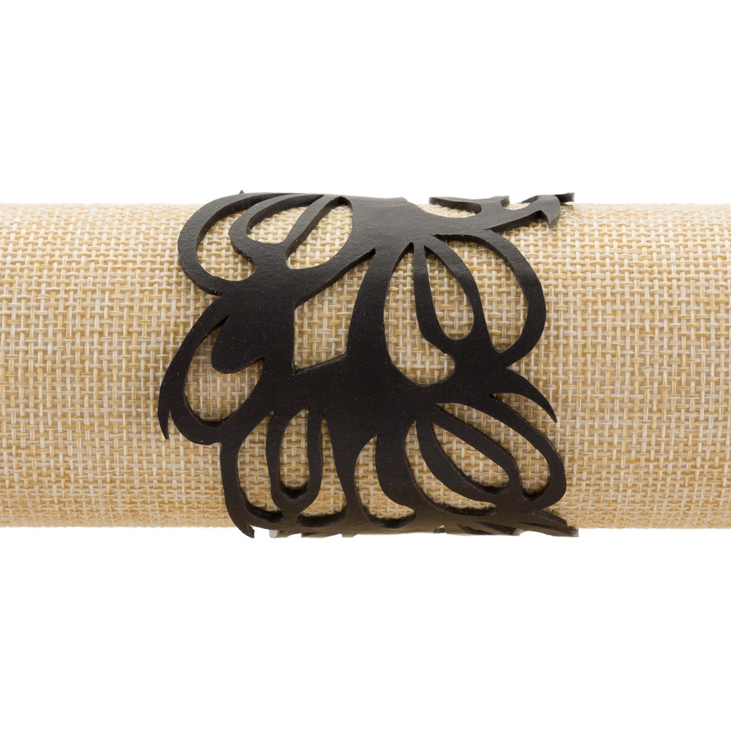 Bella Elegant Inner Tube Art Nouveau Bracelet handcrafted from recycled rubber, featuring a delicate design and button closure.