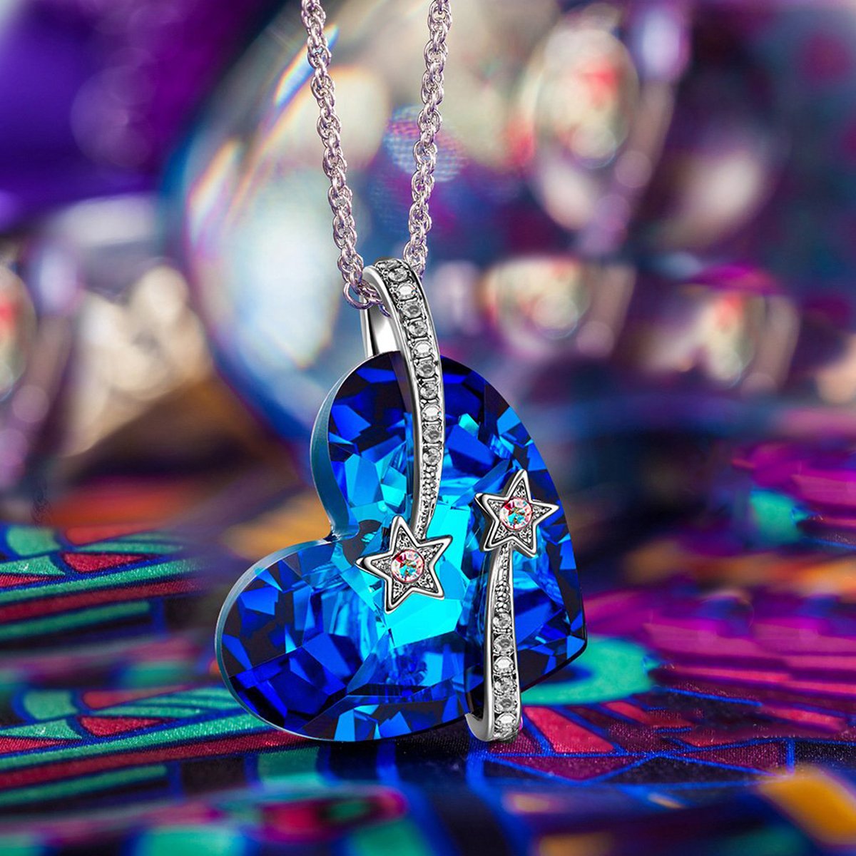 Bermuda Blue Elements Stars in the Sky Pendant Necklace in 14K white gold plating, featuring a blue stone and a unique star design.