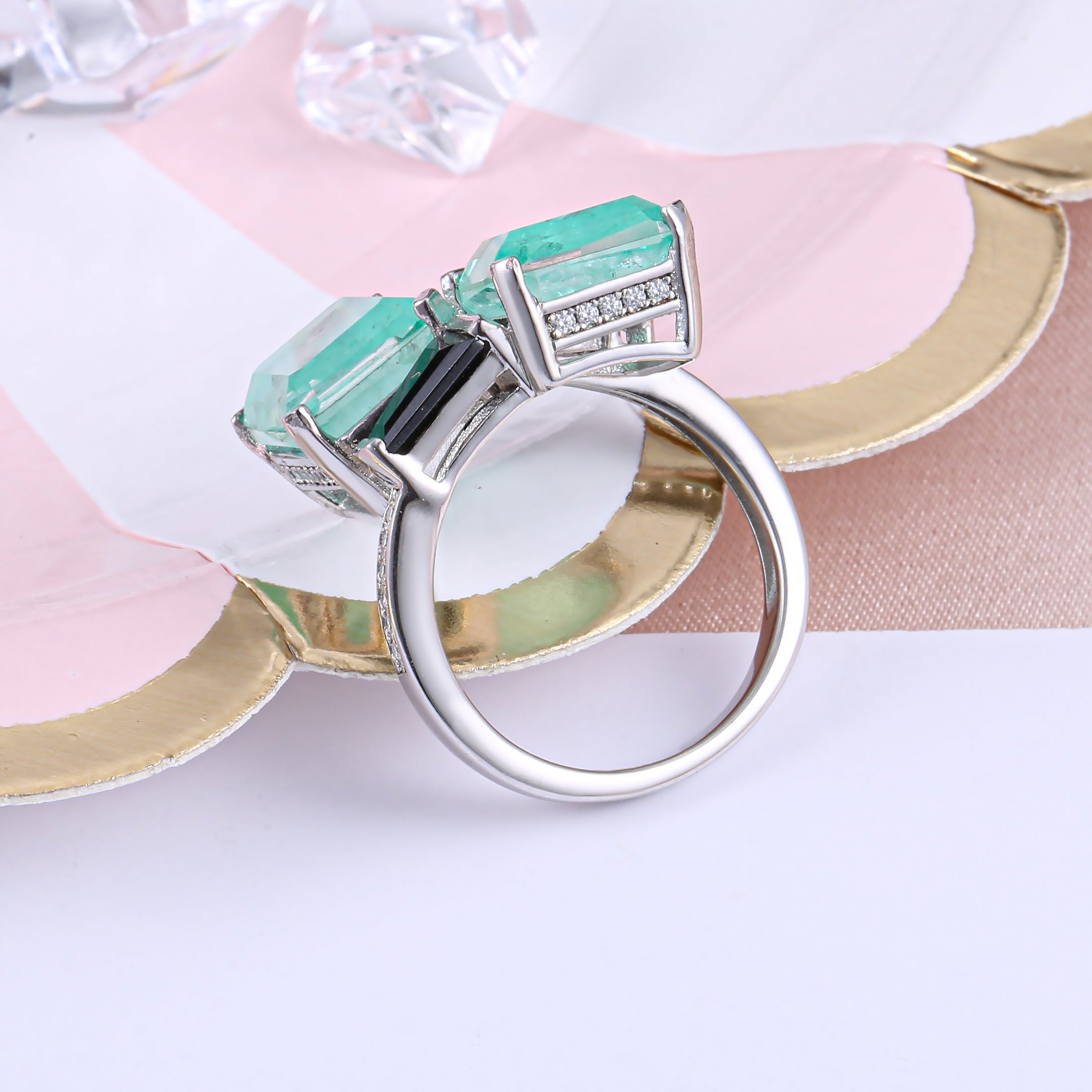 Elegant Black Baguette and See Blue Paraiba Fancy Ring in 925 sterling silver with white gold finish, showcasing vibrant stones.