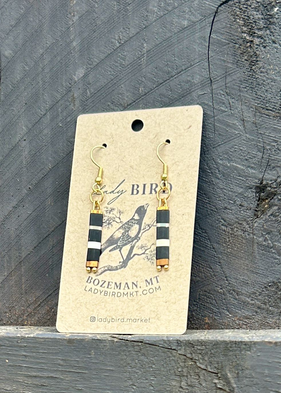 Elegant Black n' White Striped Tila Bead Earrings featuring gold or silver accents, handmade with quality Miyuki Tila beads.