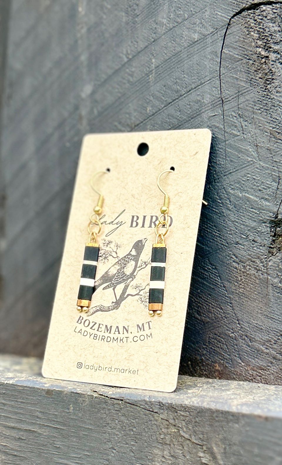 Elegant Black n' White Striped Tila Bead Earrings featuring gold or silver accents, handmade with quality Miyuki Tila beads.