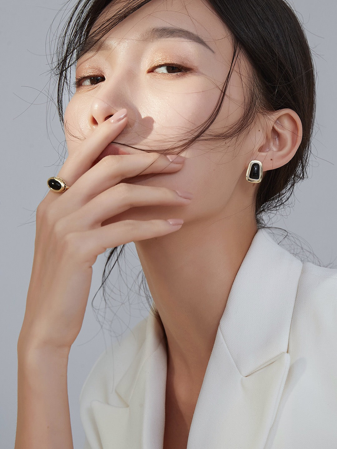 A stunning Black Onyx Oval Ring set in sterling silver with gold vermeil, showcasing its elegant design and craftsmanship.