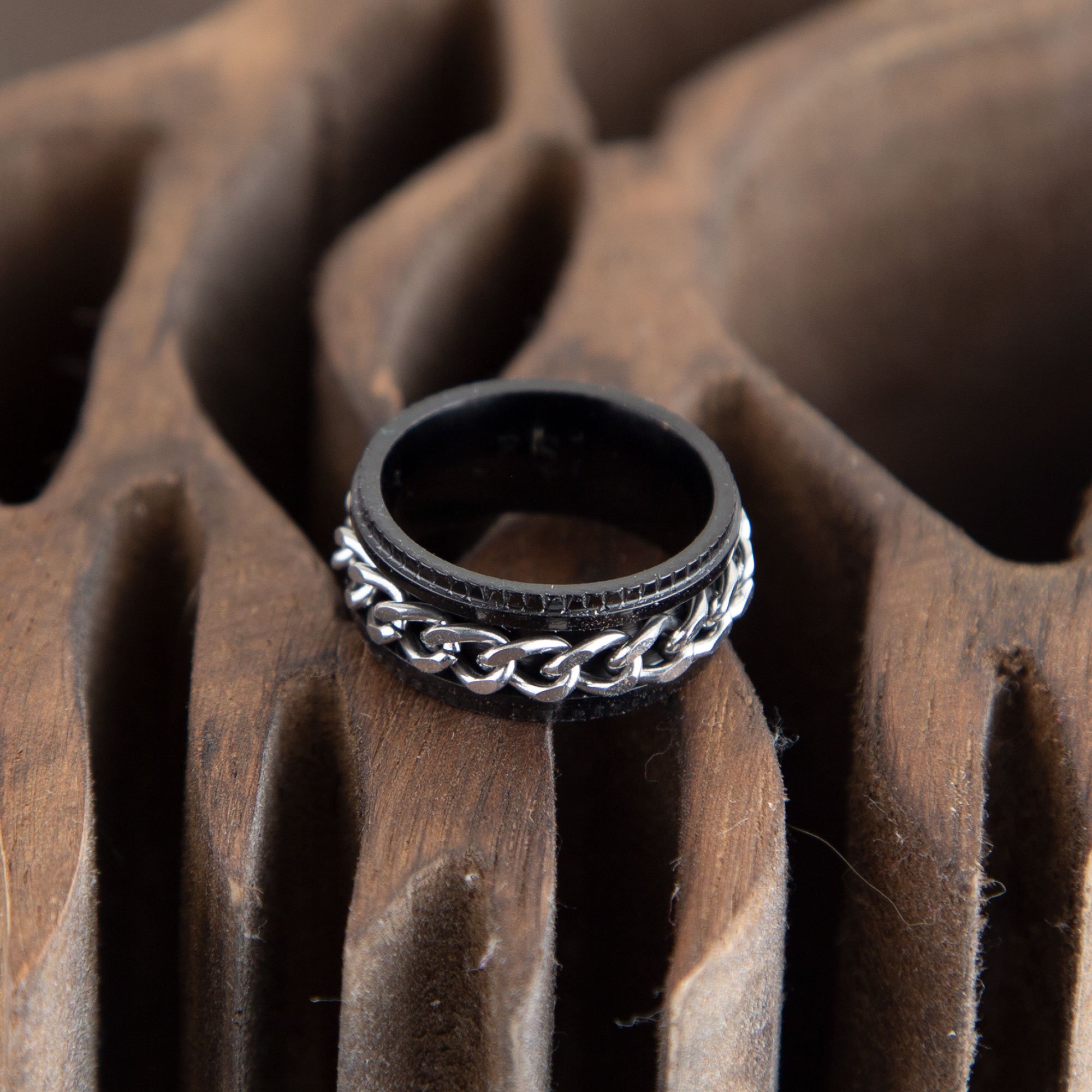 Black stainless steel spinner ring for men, featuring a chain design and 8mm width, perfect for fidgeting and personalization.