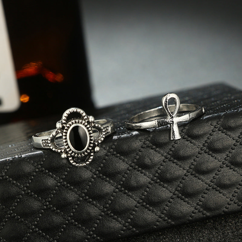 Black & White 11 Piece Bohemian Ring Set featuring 14K white gold plated brass and micro-Pav'e crystals, elegantly displayed.