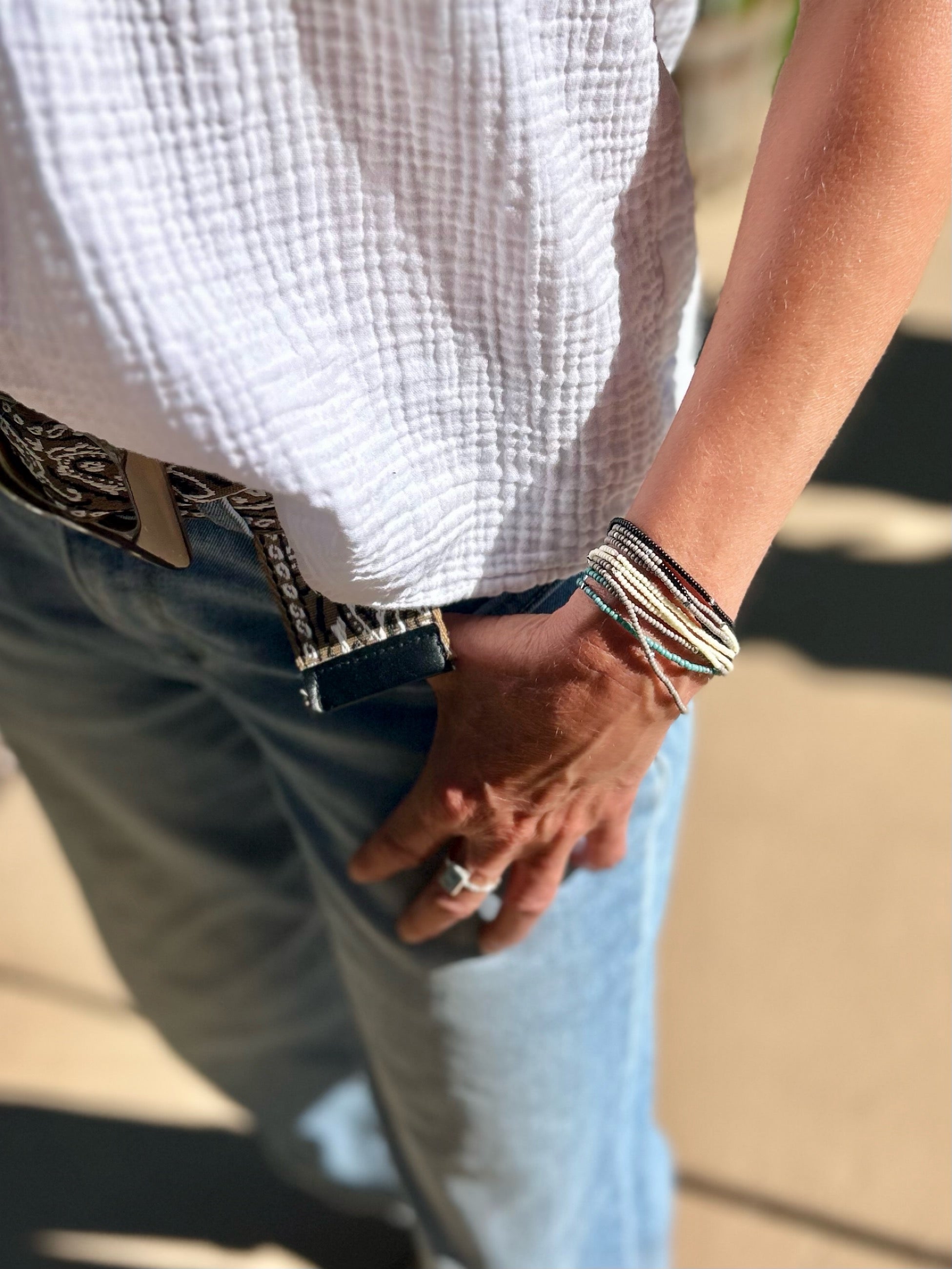 Black & White Color Vibes Silver-Sprinkle Beaded 5-Wrap Boho Bracelet featuring Czech glass seed beads and silver specks on elastic cording.