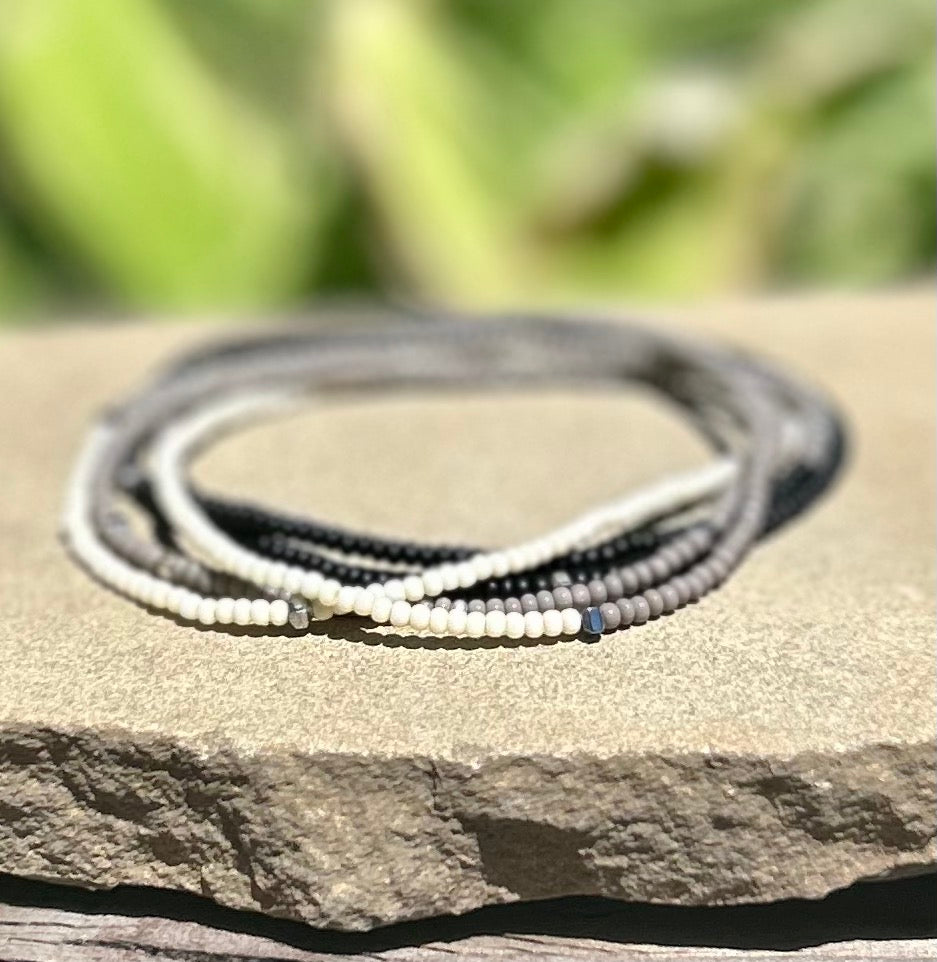Black & White Color Vibes Silver-Sprinkle Beaded 5-Wrap Boho Bracelet featuring Czech glass seed beads and silver specks on elastic cording.