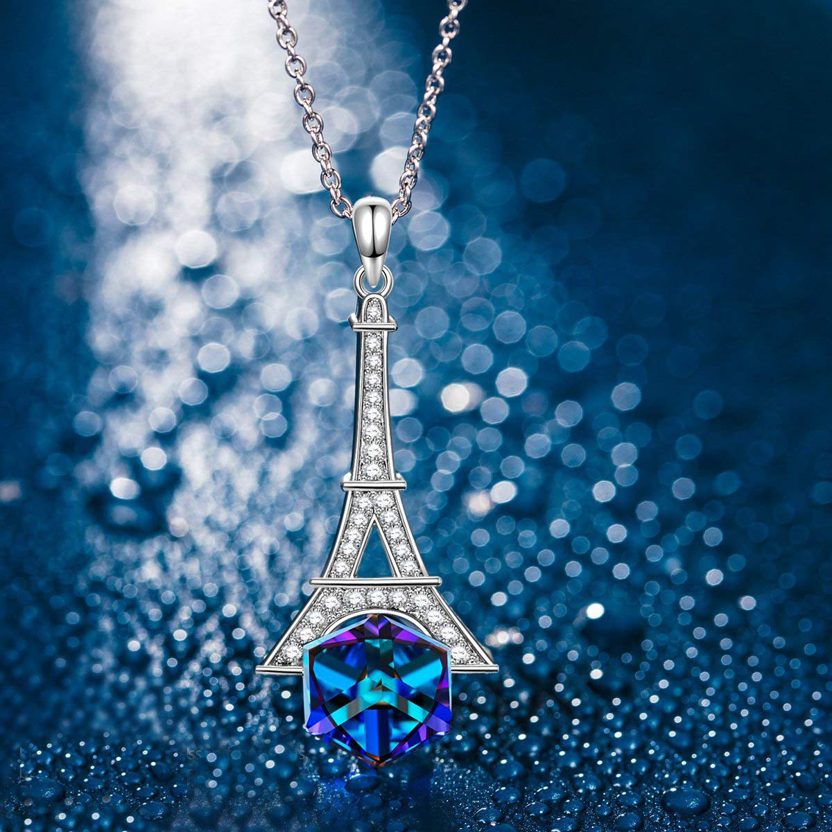 Blue Cubic Zirconia Eiffel Tower Necklace with Rhodium Plating, featuring a princess cut stone and a link chain.
