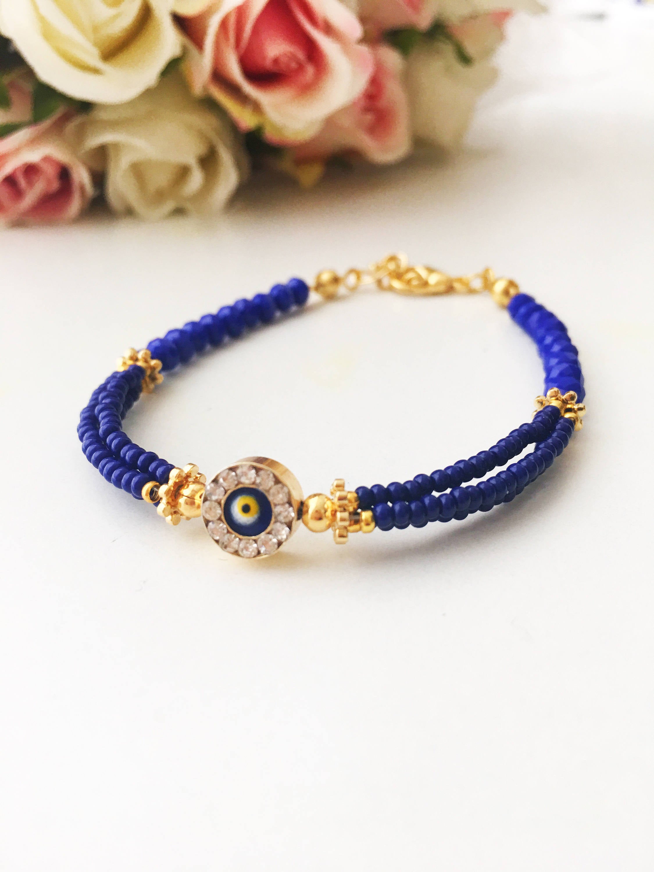 Handmade Blue Evil Eye Bracelet featuring Miyuki beads, symbolizing luck and protection, with a vibrant blue color and evil eye charm.