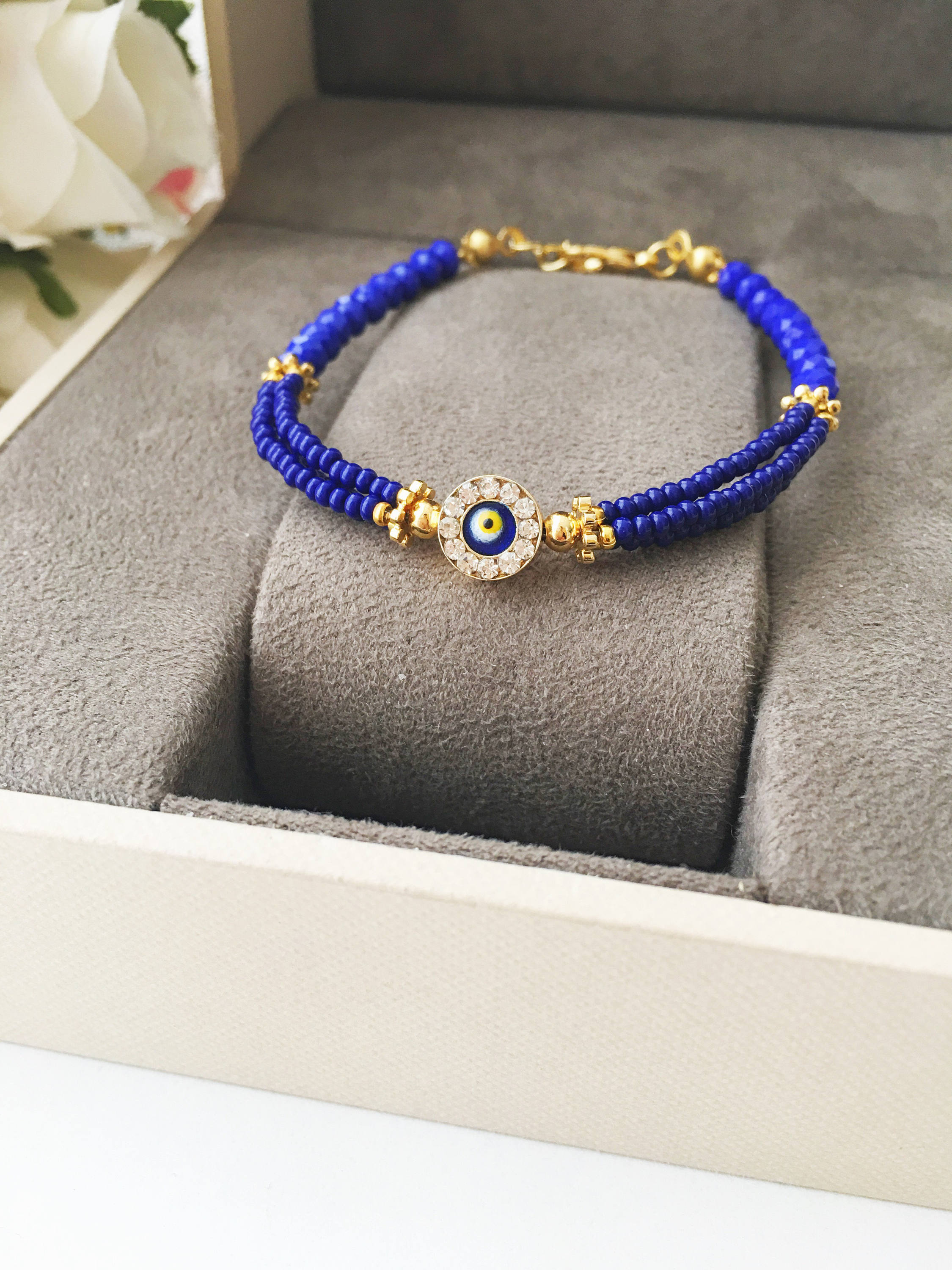Handmade Blue Evil Eye Bracelet featuring Miyuki beads, symbolizing luck and protection, with a vibrant blue color and evil eye charm.