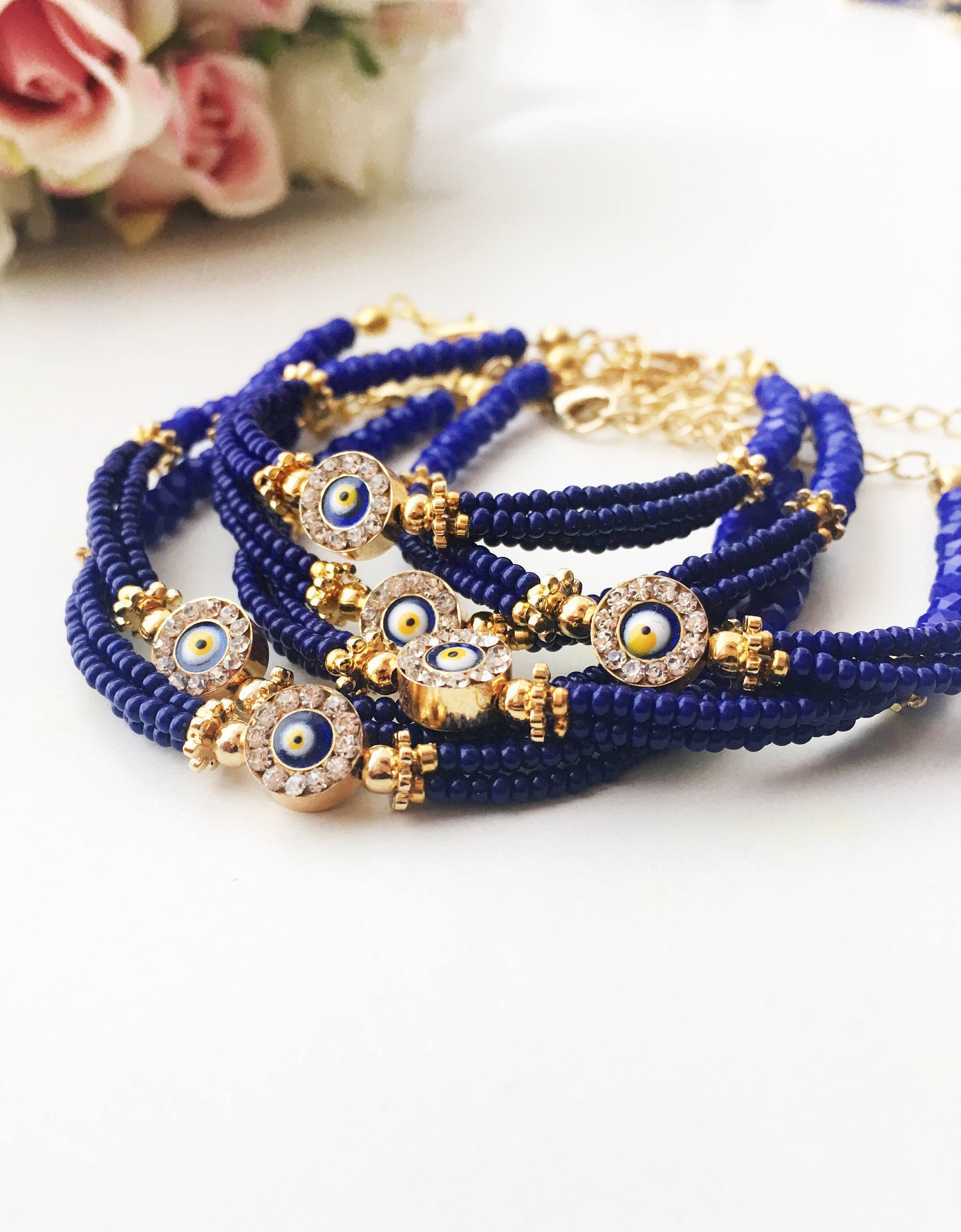 Handmade Blue Evil Eye Bracelet featuring Miyuki beads, symbolizing luck and protection, with a vibrant blue color and evil eye charm.