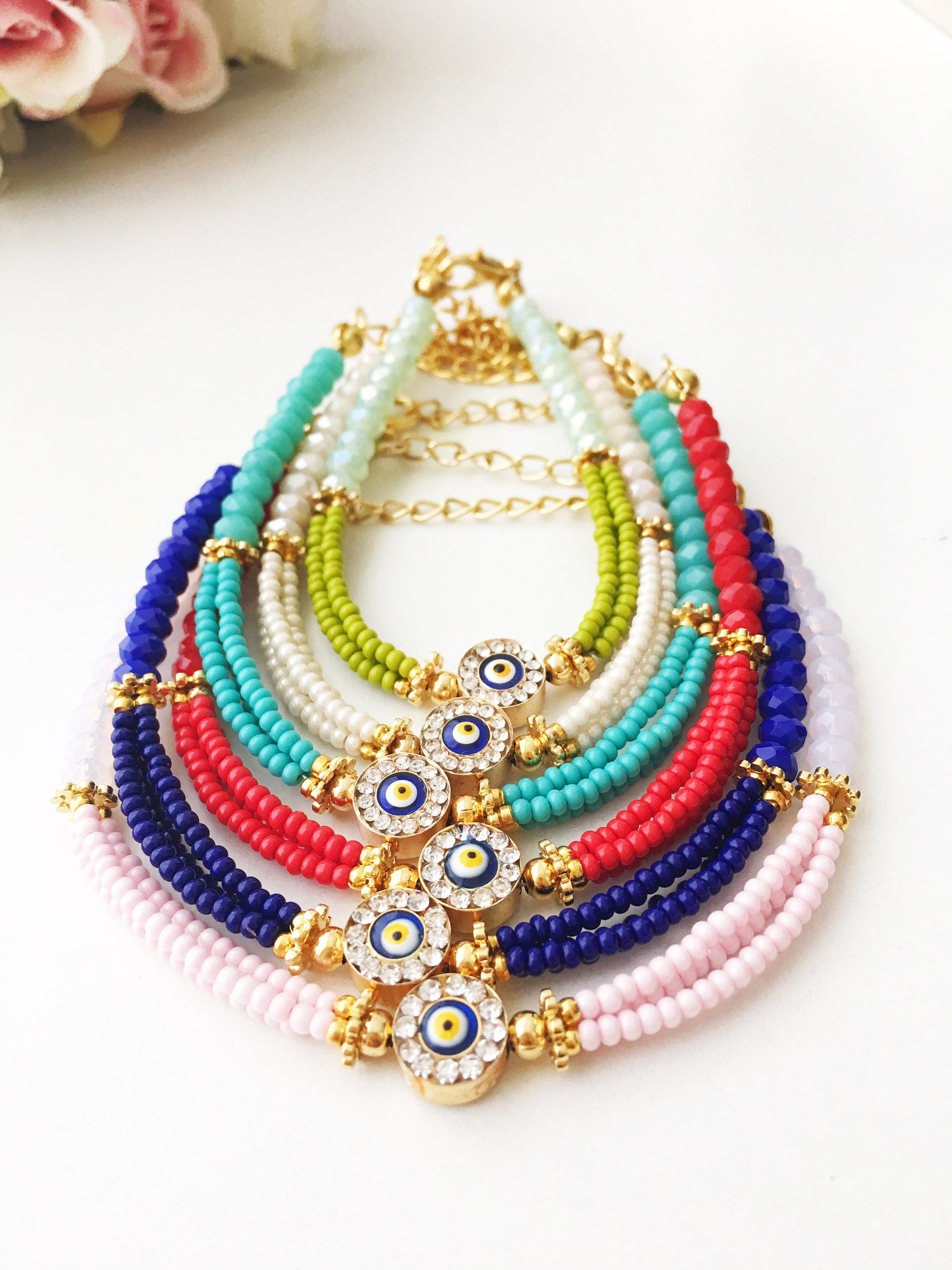 Handmade Blue Evil Eye Bracelet featuring Miyuki beads, symbolizing luck and protection, with a vibrant blue color and evil eye charm.