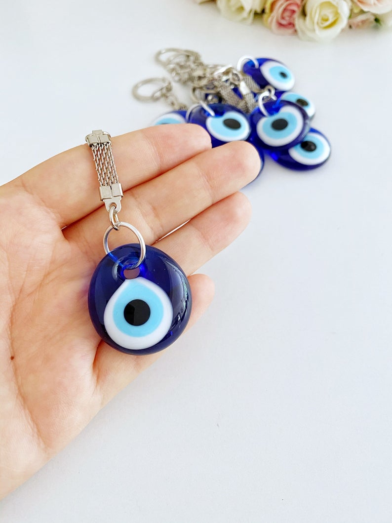 A beautiful Blue Evil Eye Keychain featuring a glass evil eye bead, measuring 10cm in total length, perfect for keys or bags.