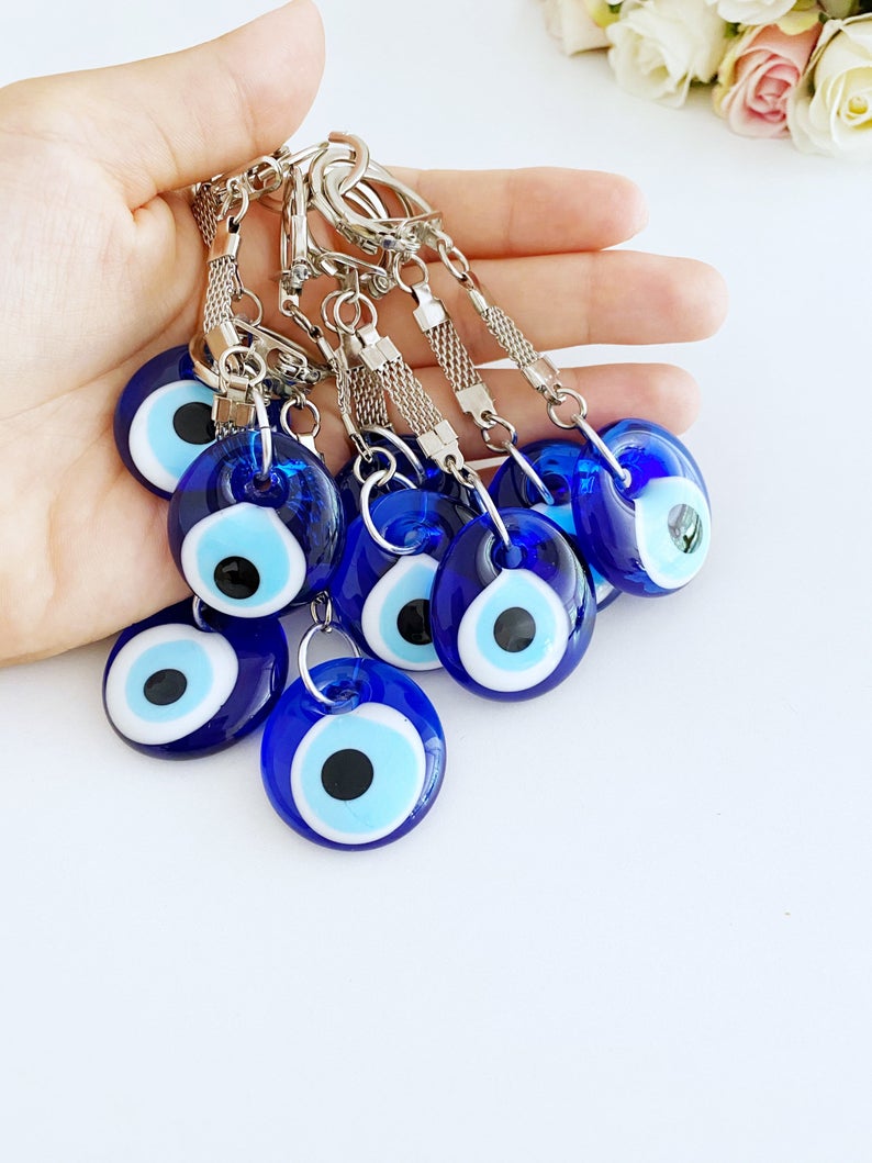 A beautiful Blue Evil Eye Keychain featuring a glass evil eye bead, measuring 10cm in total length, perfect for keys or bags.